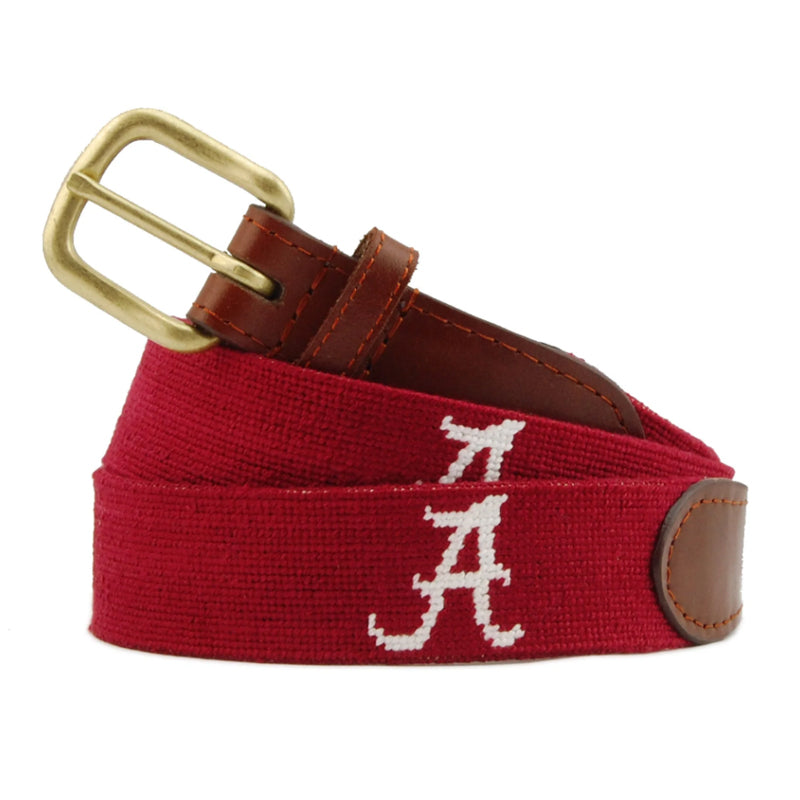 Crimson red Alabama script A needlepoint belt coiled with antique brass buckle brown leather