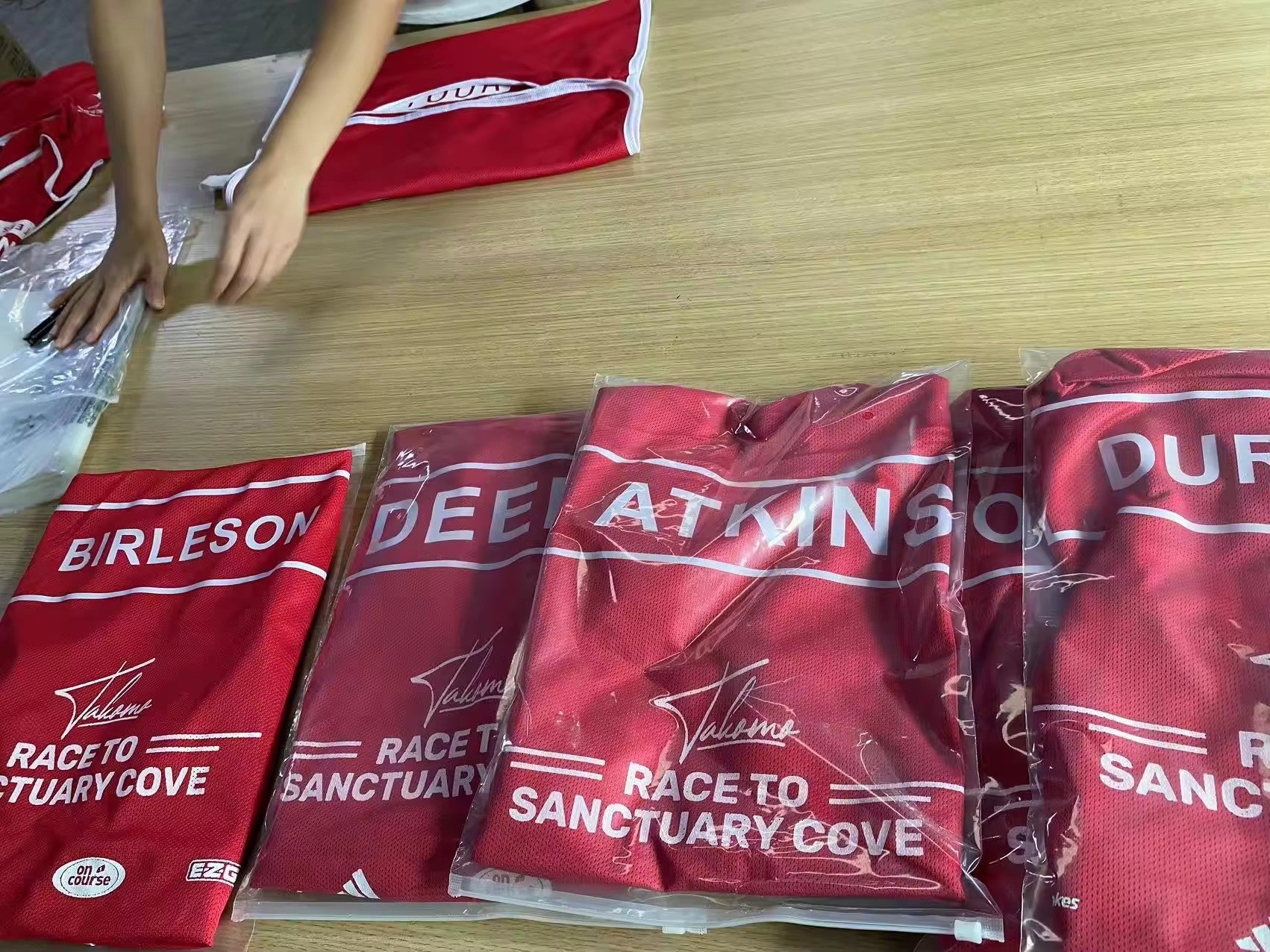 Red custom sublimation printed golf caddie bibs factory bulk production