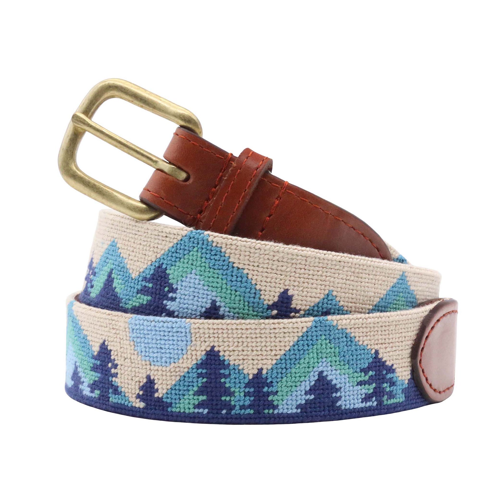 Navy blue UNC Tar Heels needlepoint belt coiled showing Ram mascot Old Well colonnade Carolina blue logo brass buckle