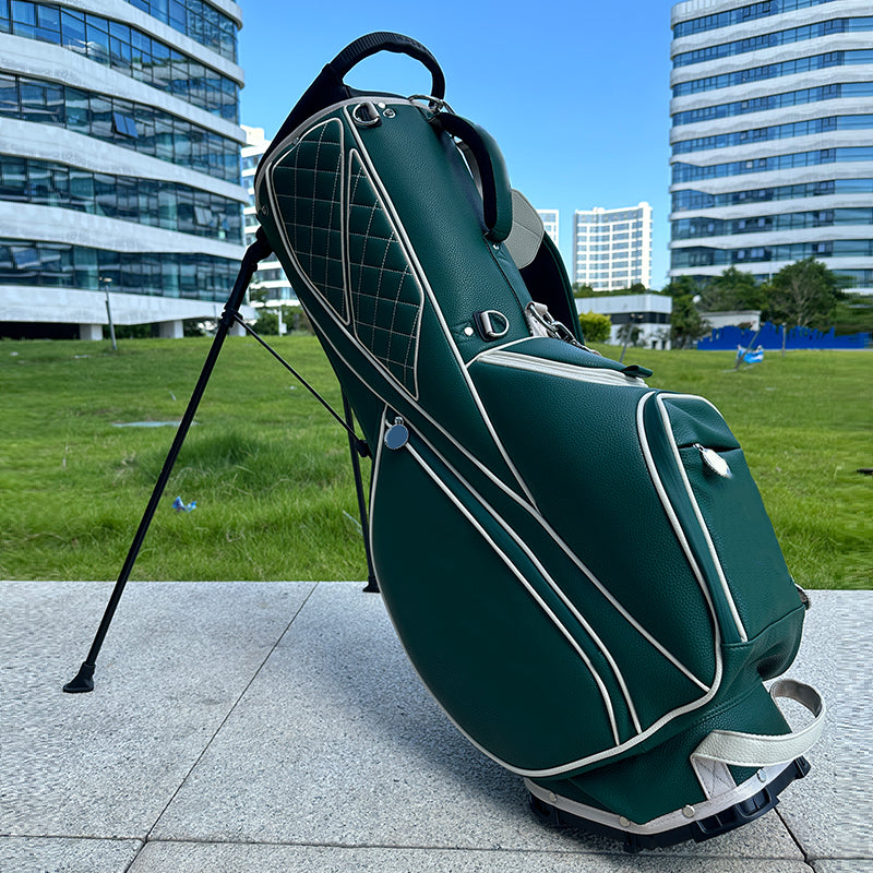 Quilted diamond stitch forest green PU leather golf stand bag with silver hardware on urban plaza
