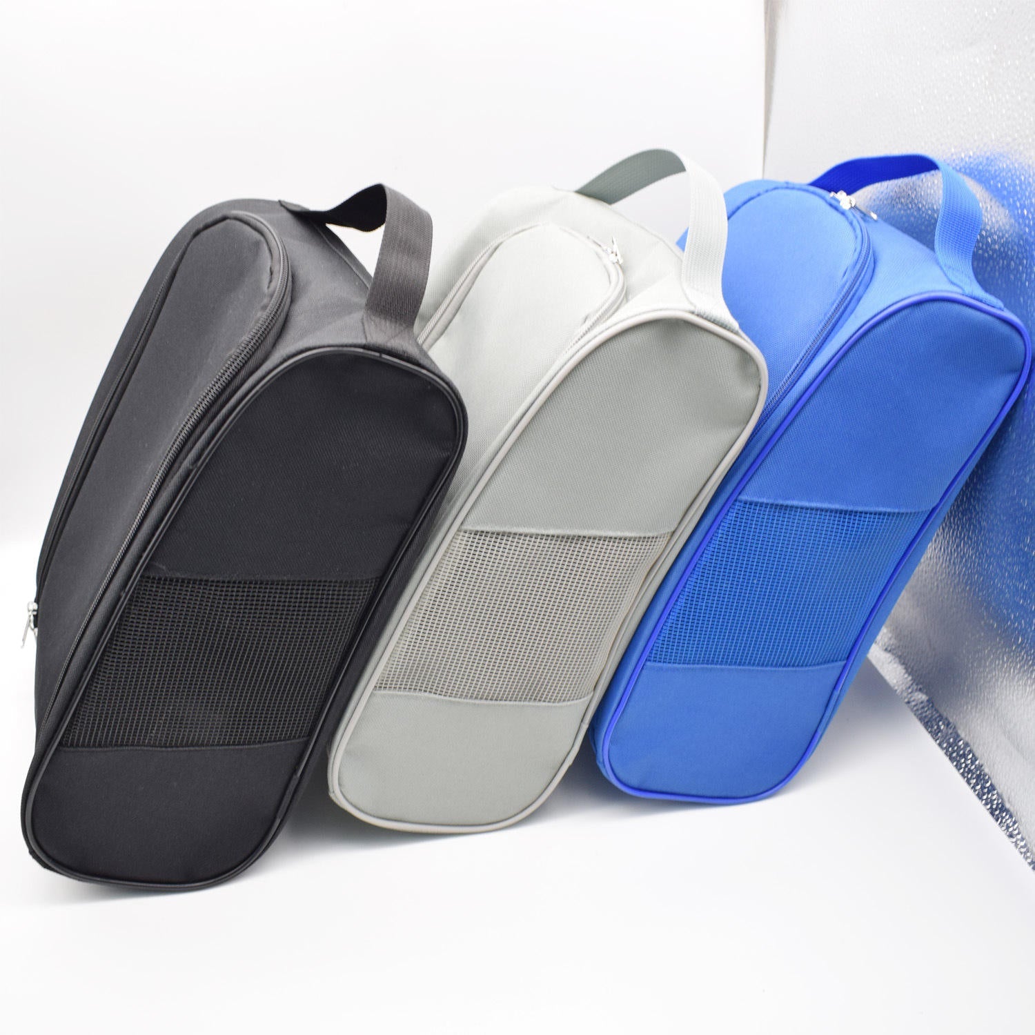 Multi-color golf shoe bag in black grey and blue horizontal style