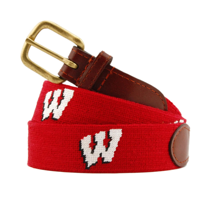 Red needlepoint belt with white W university letter and antique brass buckle coiled view