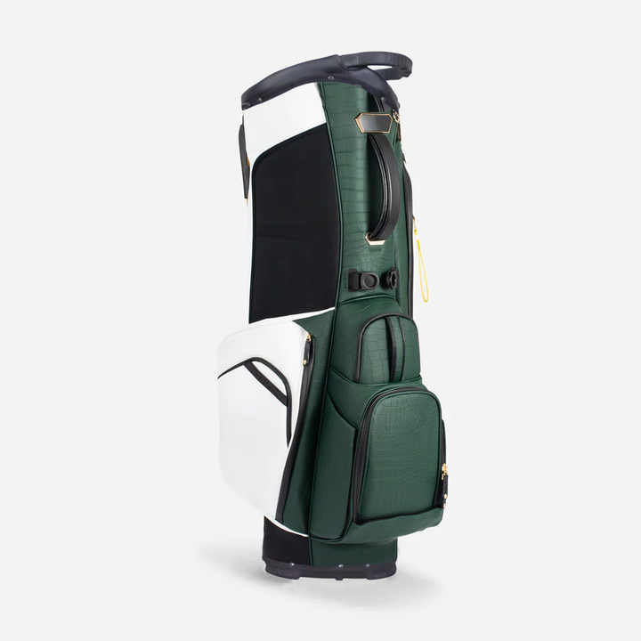 White forest green colorblock PU leather golf stand bag side view on course
