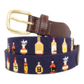 Whiskey bottles needlepoint belt coiled upright view with antique brass buckle detail
