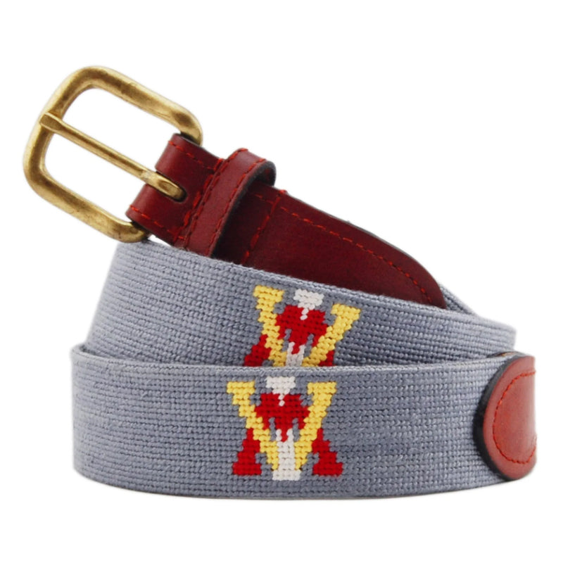 Grey needlepoint belt with red and yellow monogram letter motif and brass buckle