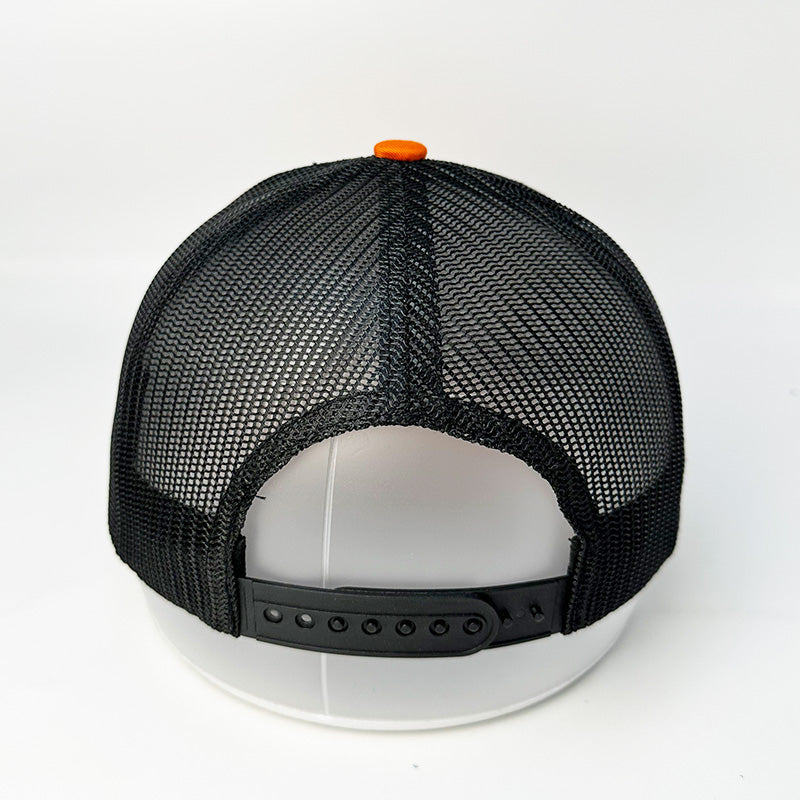 Custom blaze orange black trucker hat back view with snapback closure