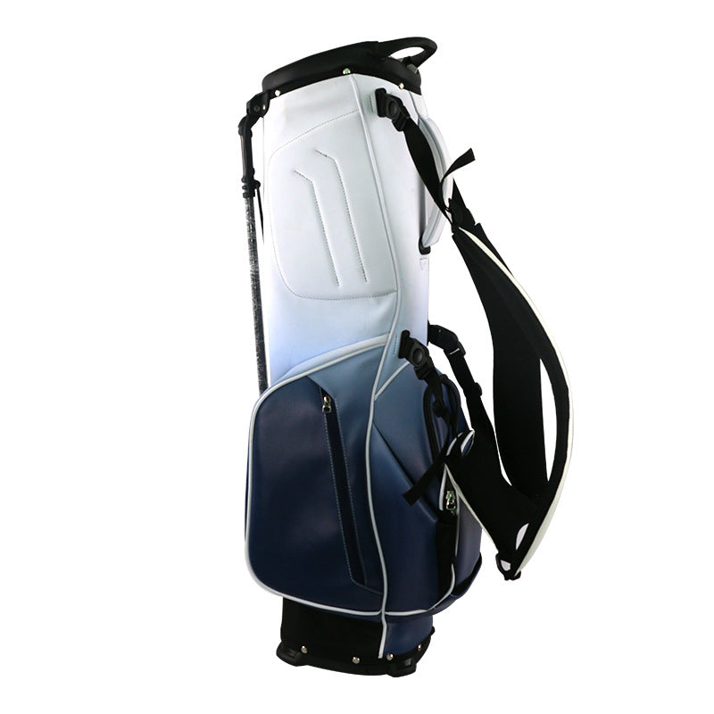 Gradient white navy and white green golf stand bag side by side on golf course
