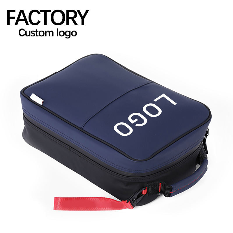 Navy golf shoe bag lying flat showing full zip opening