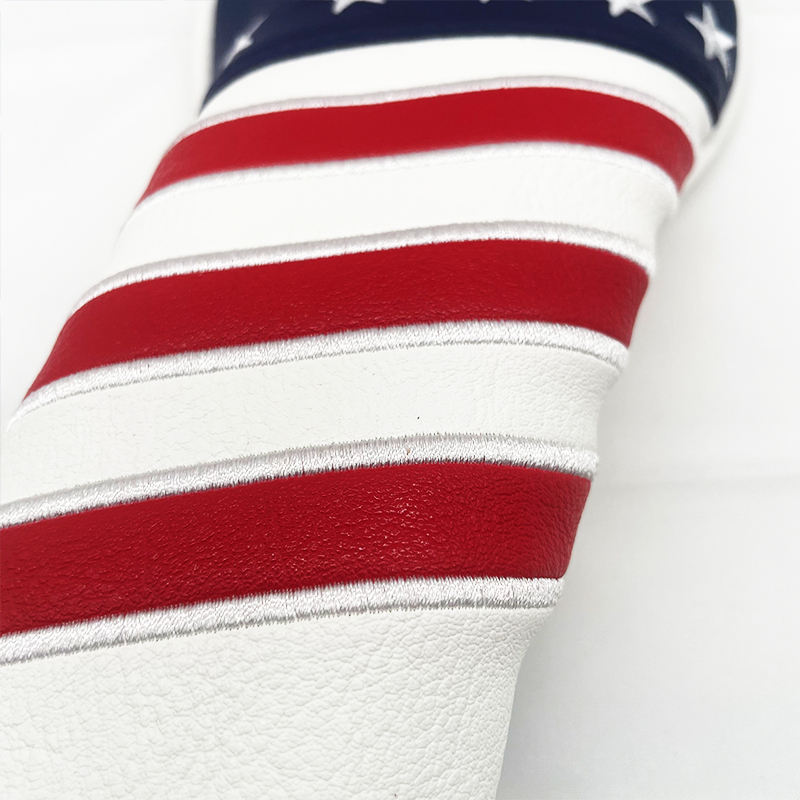Red white stripe embroidery detail on USA golf headcover — premium PU leather craftsmanship