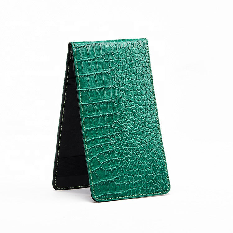 Green crocodile grain leather golf scorecard holder standing upright side view